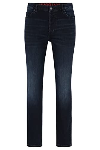 HUGO Herren 634 Tapered-Fit Jeans aus blauschwarzem Stretch-Denim Dunkelblau 31/34 von HUGO