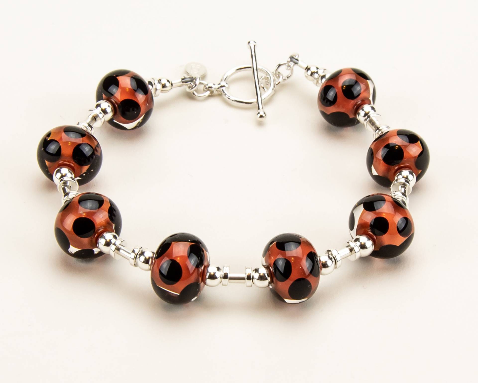 Lampwork Glasperle Koralle Mit Schwarzen Polka Dots Armband Lampwork Glasperle Koralle Mit Schwarzen Polka Dots Armband von HallockGlass