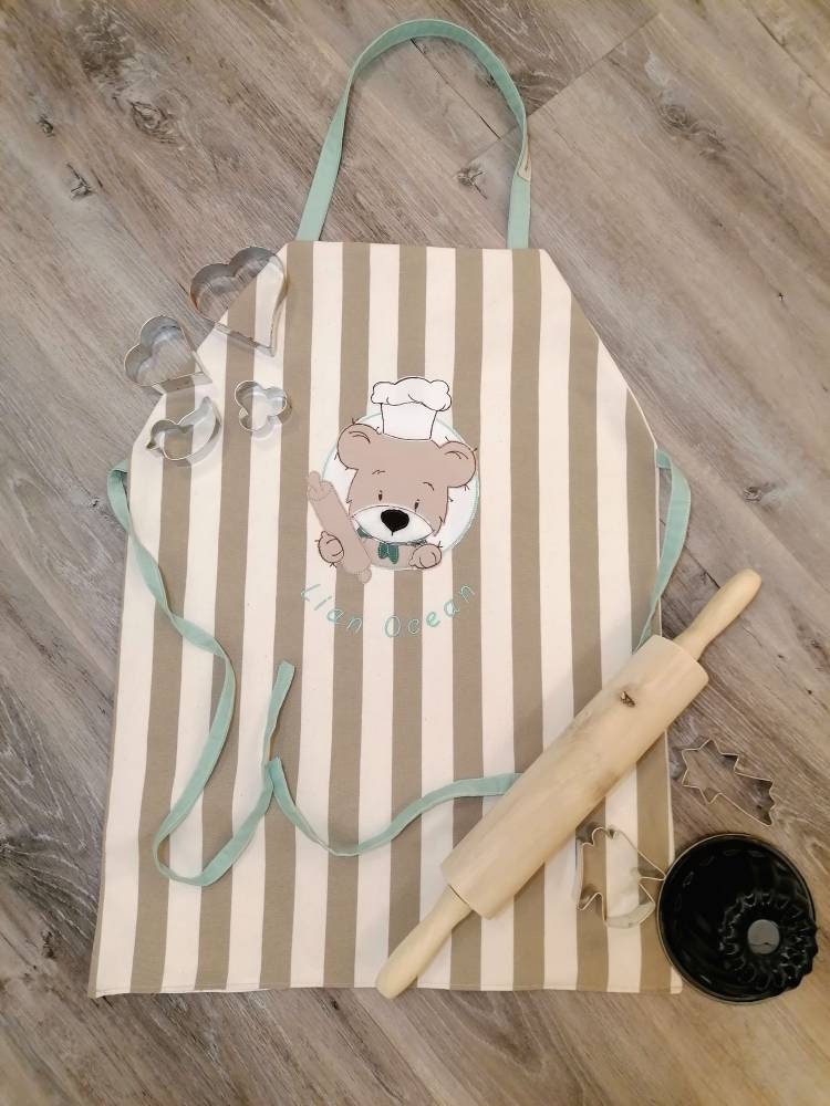 Kinderschürze, Kochschürze, Backschürze, Backbär Unisex Mädchen, Junge, Rosa, Türkis von Handandlovemade