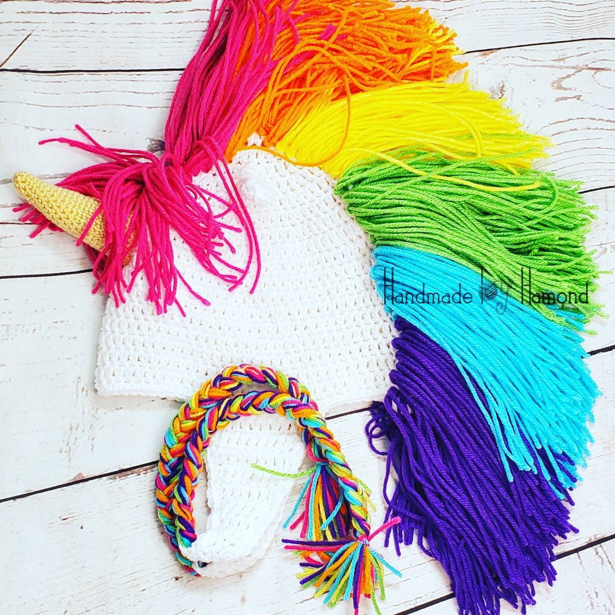 Regenbogen Einhorn Mütze Regenbogen Einhorn Mütze von HandmadeByHamond