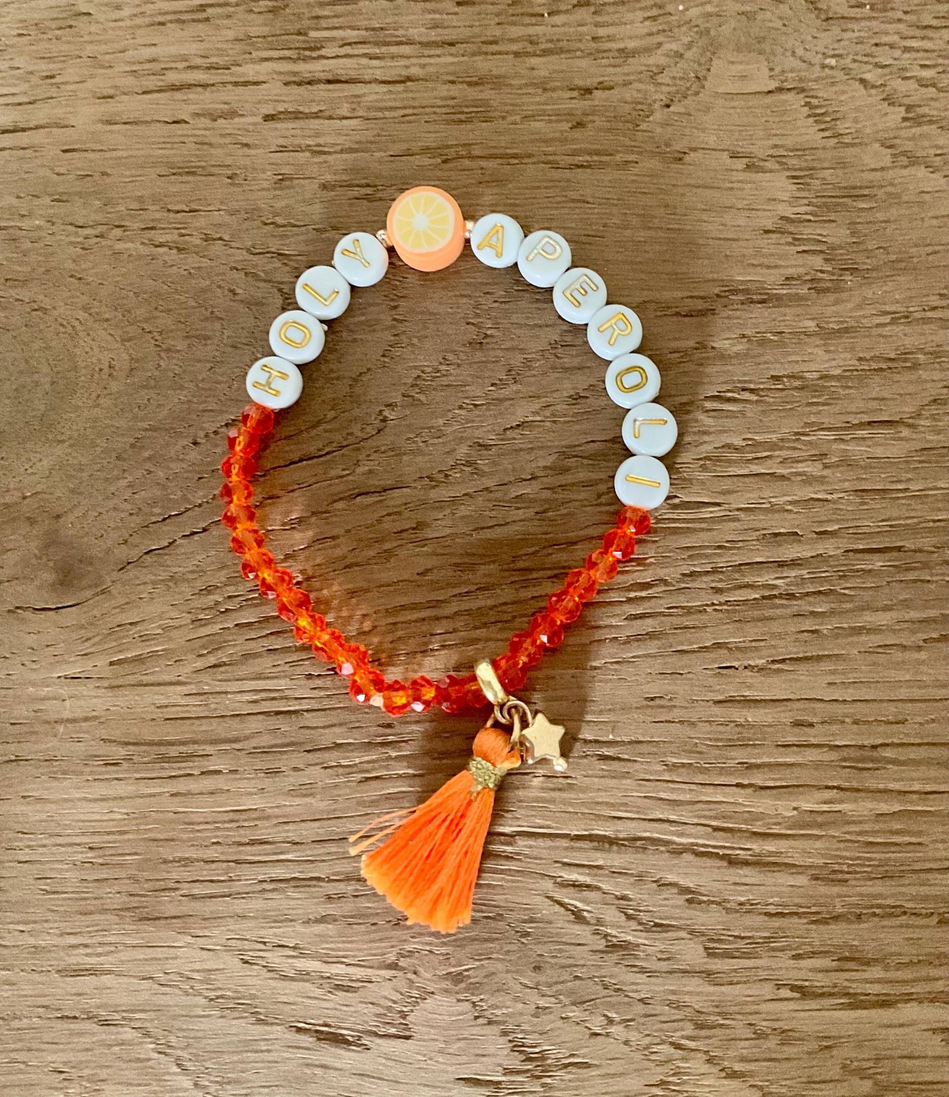 Holy Aperoli Armband Orange Weiß Mit Stern Und Quaste Holy Aperoli Armband Orange Weiß Mit Stern Und Quaste von HappieNettie