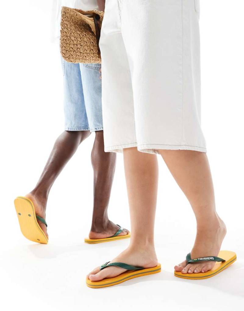 Havaianas - Unisex-Zehenstegsandalen in Gelb mit brasilianischem Logo von Havaianas