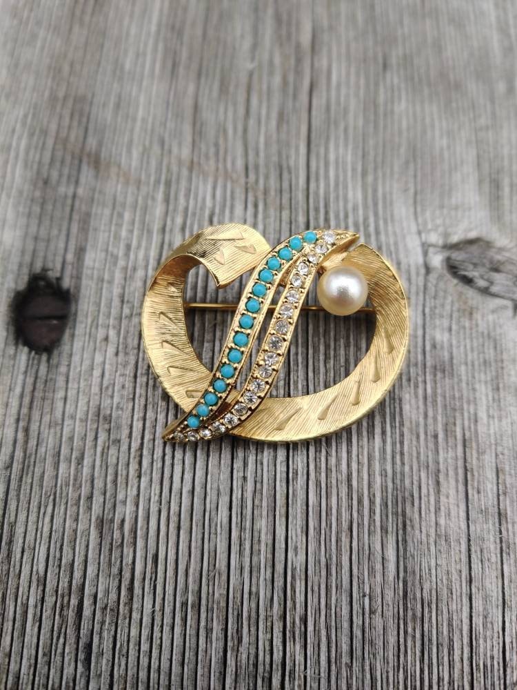 Vintage Sphinx Brosche, Modell 9726 60Er Jahre, Goldfarbene Brosche Vintage Sphinx Brosche, Modell 9726 60Er Jahre, Goldfarbene Brosche von Historyprops