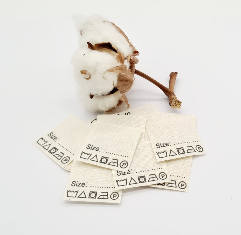 Textiletiketten Mit Dem Aufdruck "Size" Zum Selbstausfüllen Auf Naturbaumwollband Textiletiketten Mit Dem Aufdruck "Size" Zum Selbstausfüllen Auf Naturbaumwollband von HoedtkeVertrieb