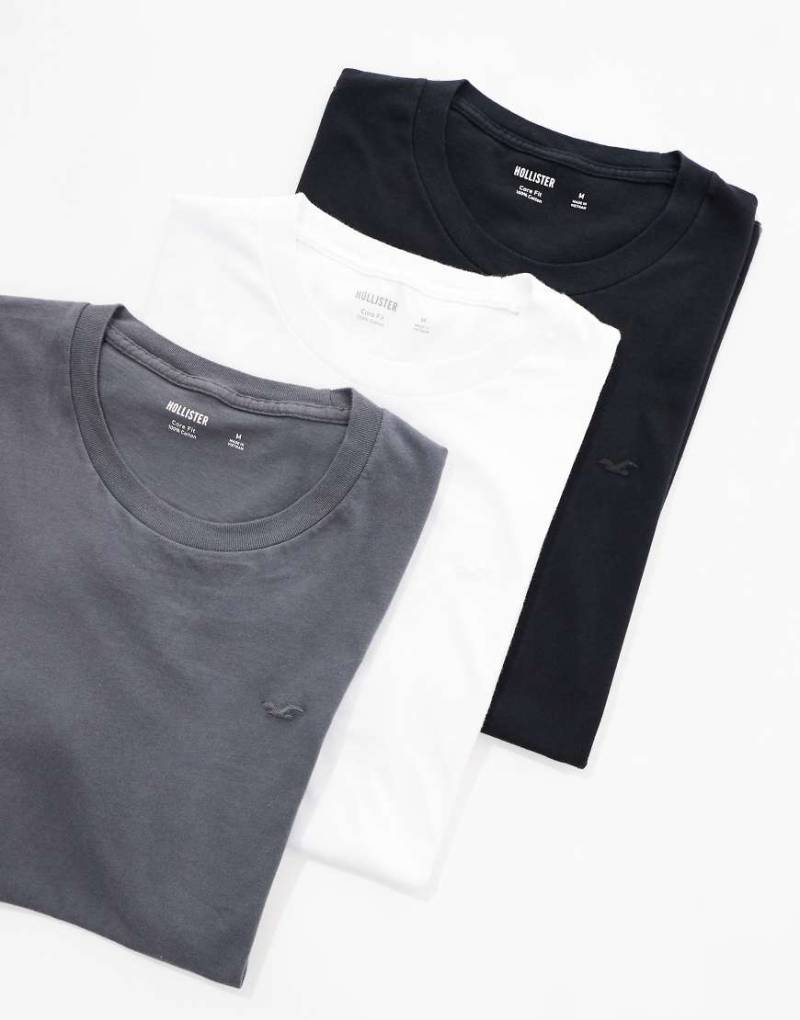 Hollister - 3er-Pack Classic Fit T-Shirts in Neutral mit Logo auf der Brust Hollister - 3er-Pack Classic Fit T-Shirts in Neutral mit Logo auf der Brust von Hollister