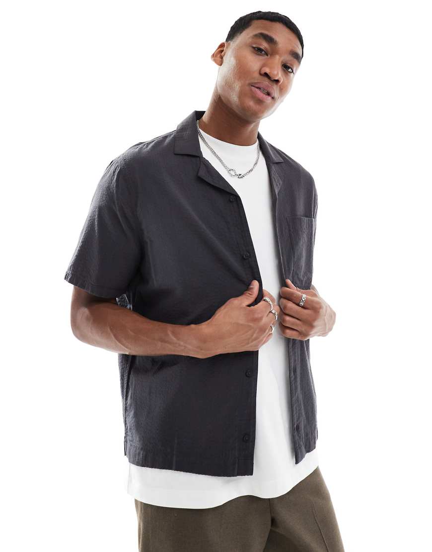 Hollister - Kurzärmlige, strukturierte Hemdbluse in Schwarz Hollister - Kurzärmlige, strukturierte Hemdbluse in Schwarz von Hollister