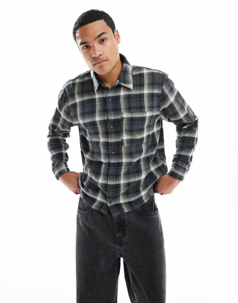 Hollister - Langärmliges, kariertes Flanellhemd in Schwarz Hollister - Langärmliges, kariertes Flanellhemd in Schwarz von Hollister