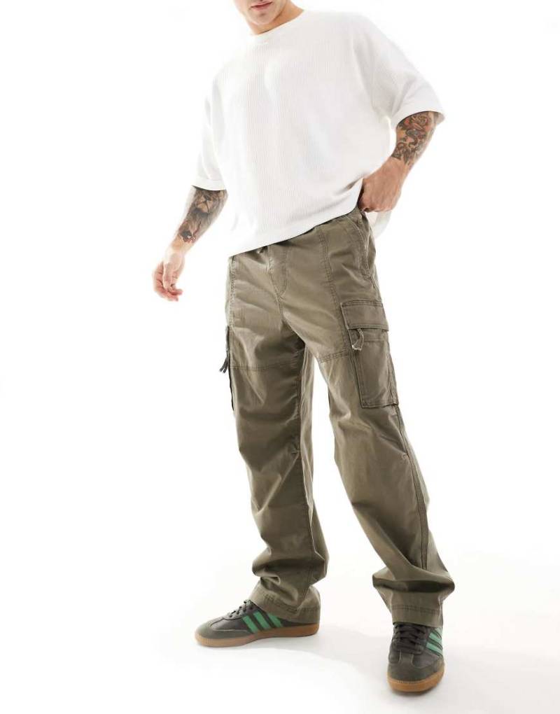 Hollister - Lockere Cargohose in Grau mit elastischem Bund Hollister - Lockere Cargohose in Grau mit elastischem Bund von Hollister