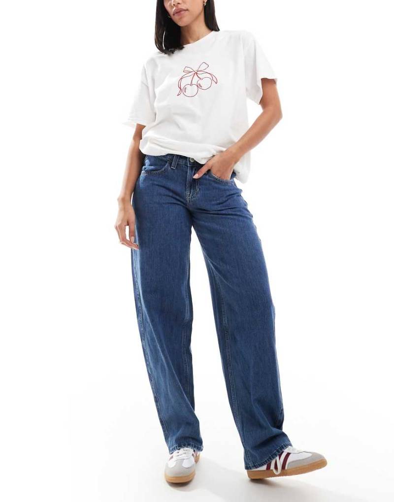 Hollister - Schmal zulaufende Baggy-Jeans in dunkelblauer Waschung mit niedrigem Bund von Hollister