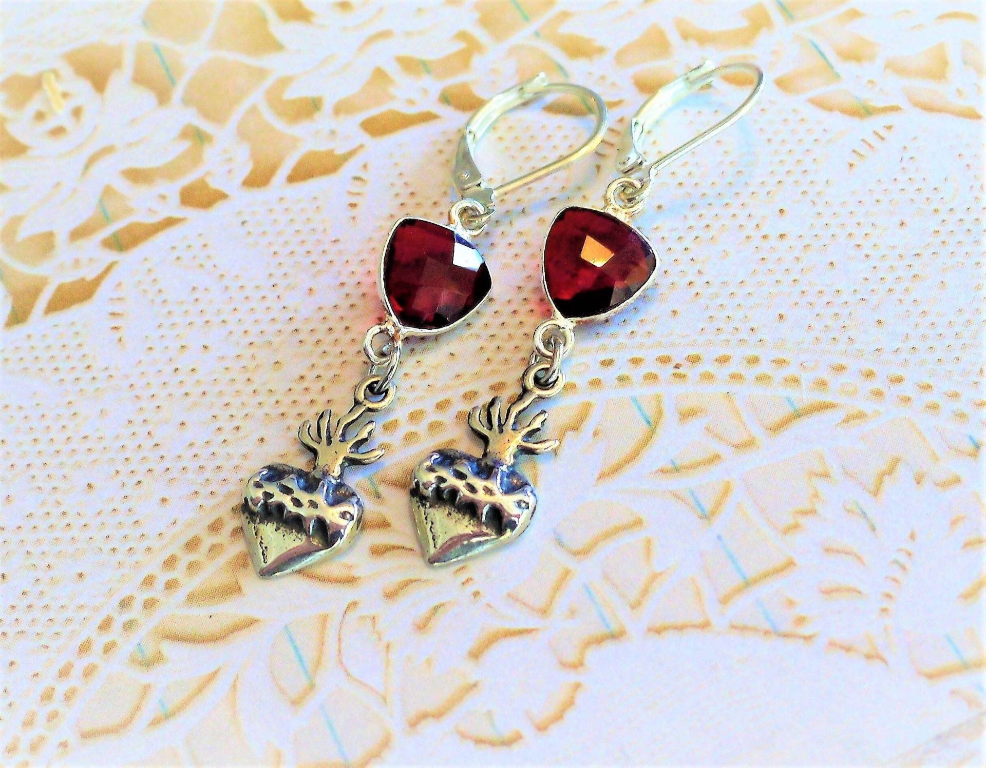 Hearts A Flame, Ex Voto , Hammered Sterling Silver , Sacred Flaming Heart, & Genuine Garnet Gemstone Earrings By Hollywood Hillbilly Hearts A Flame, Ex Voto , Hammered Sterling Silver , Sacred Flaming Heart, & Genuine Garnet Gemstone Earrings By Hollywood Hillbilly von HollywoodHillbilly