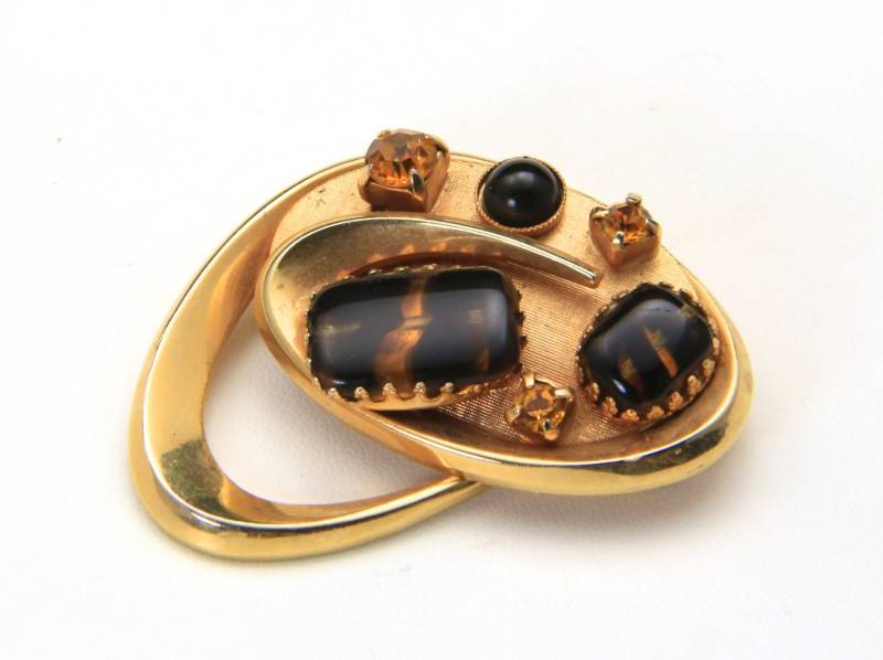 Vintage Gold Ton Bernstein Strass Schildkröte Glas Edelsteine Bumerang Pin Brosche Retro Vintage Gold Ton Bernstein Strass Schildkröte Glas Edelsteine Bumerang Pin Brosche Retro von HouseofVintageOnline