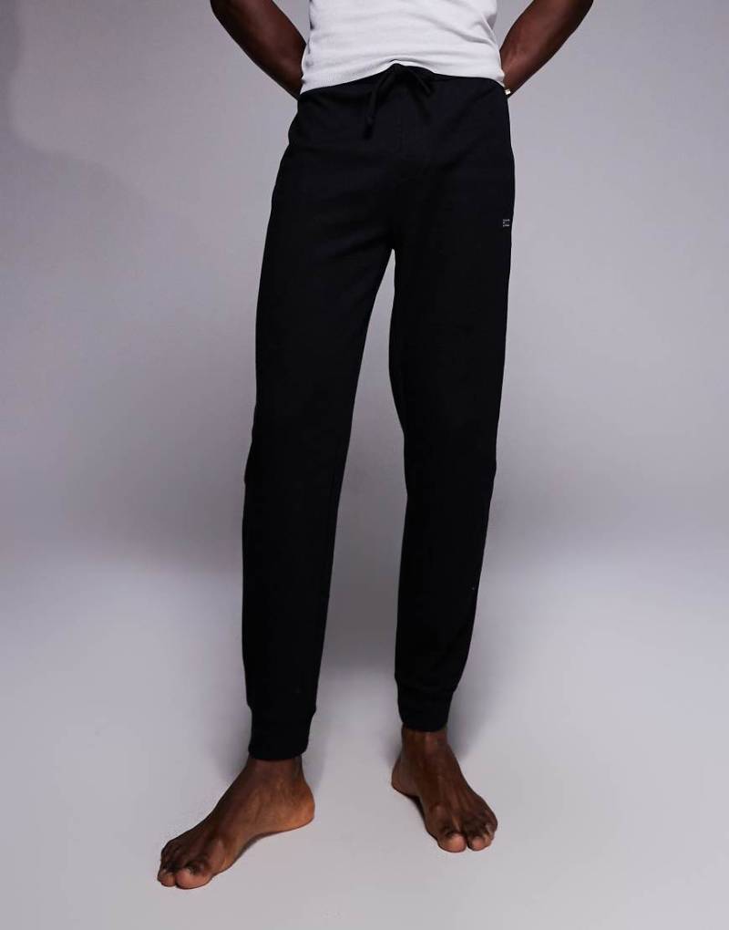 BOSS Bodywear - Lounge-Jogginghose in Schwarz mit Waffelstruktur und Bündchen von Hugo Red