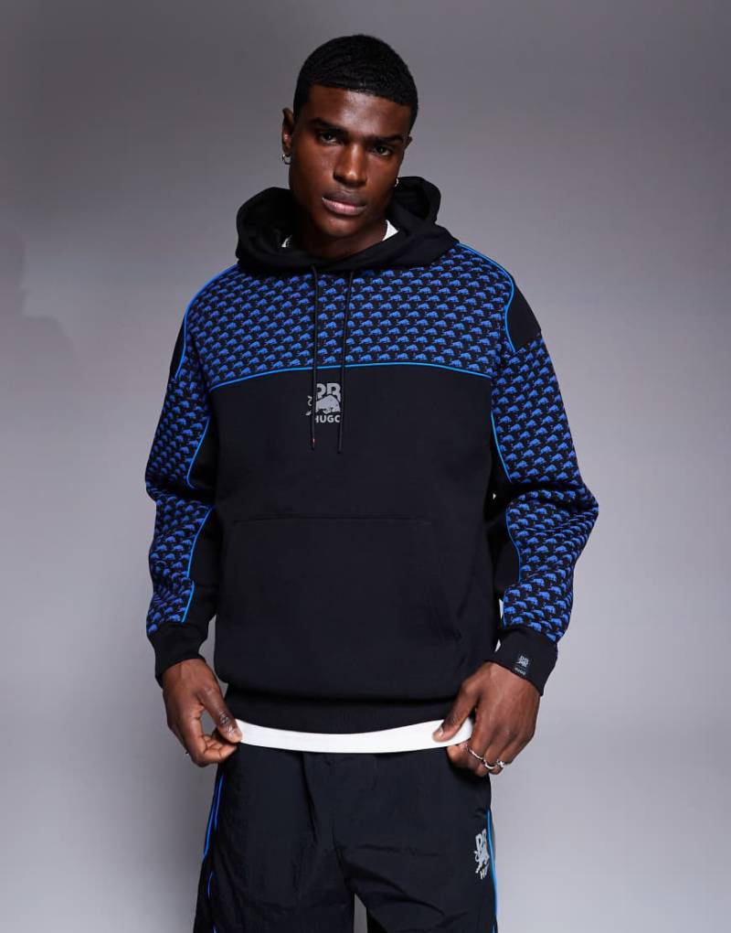 HUGO - Red Bull Racing Capsule - Dilverston - Oversize-Kapuzenpullover in Schwarz mit blauer Paspelierung und Logoprint von Hugo Red