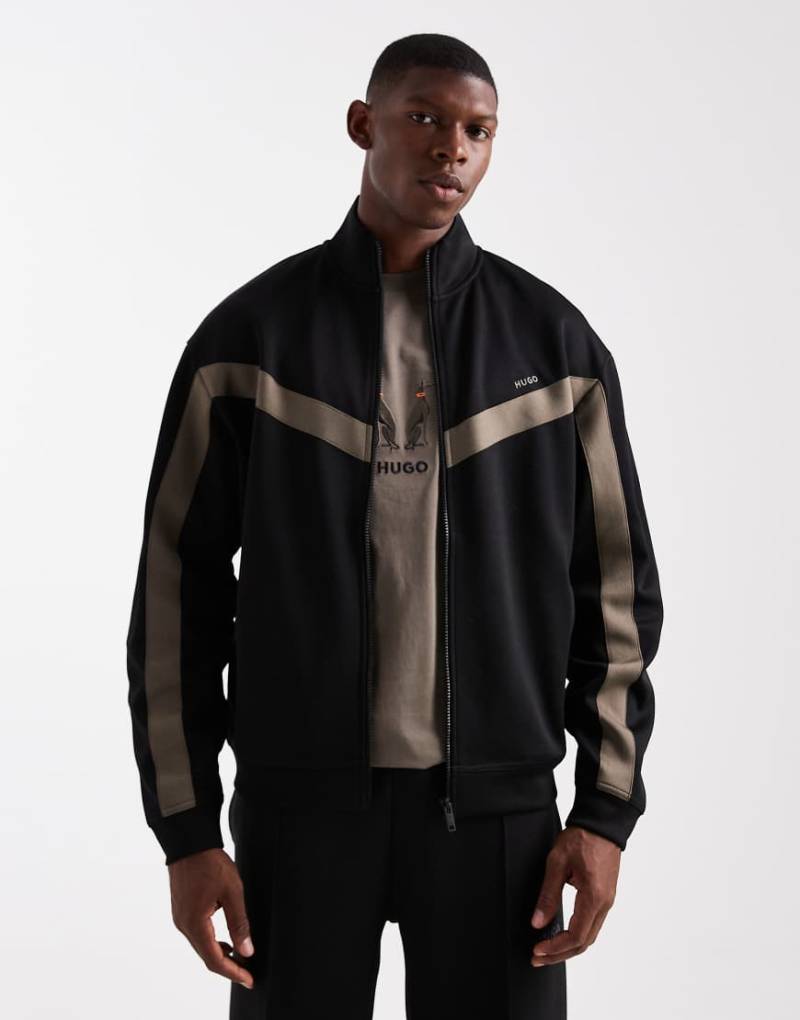 HUGO Red - Darti - Locker geschnittene Trainingsjacke in Schwarz mit Zierstreifen und Logo von Hugo Red