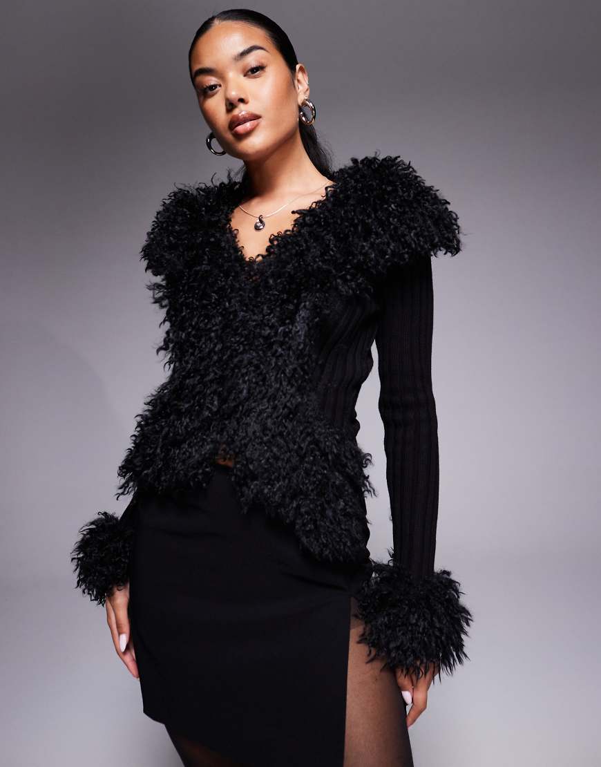 I. AM. GIA - Cressida - Kompakte Strickjacke in Schwarz mit Reißverschluss und zotteligem Kunstpelzbesatz I. AM. GIA - Cressida - Kompakte Strickjacke in Schwarz mit Reißverschluss und zotteligem Kunstpelzbesatz von I.AM.GIA
