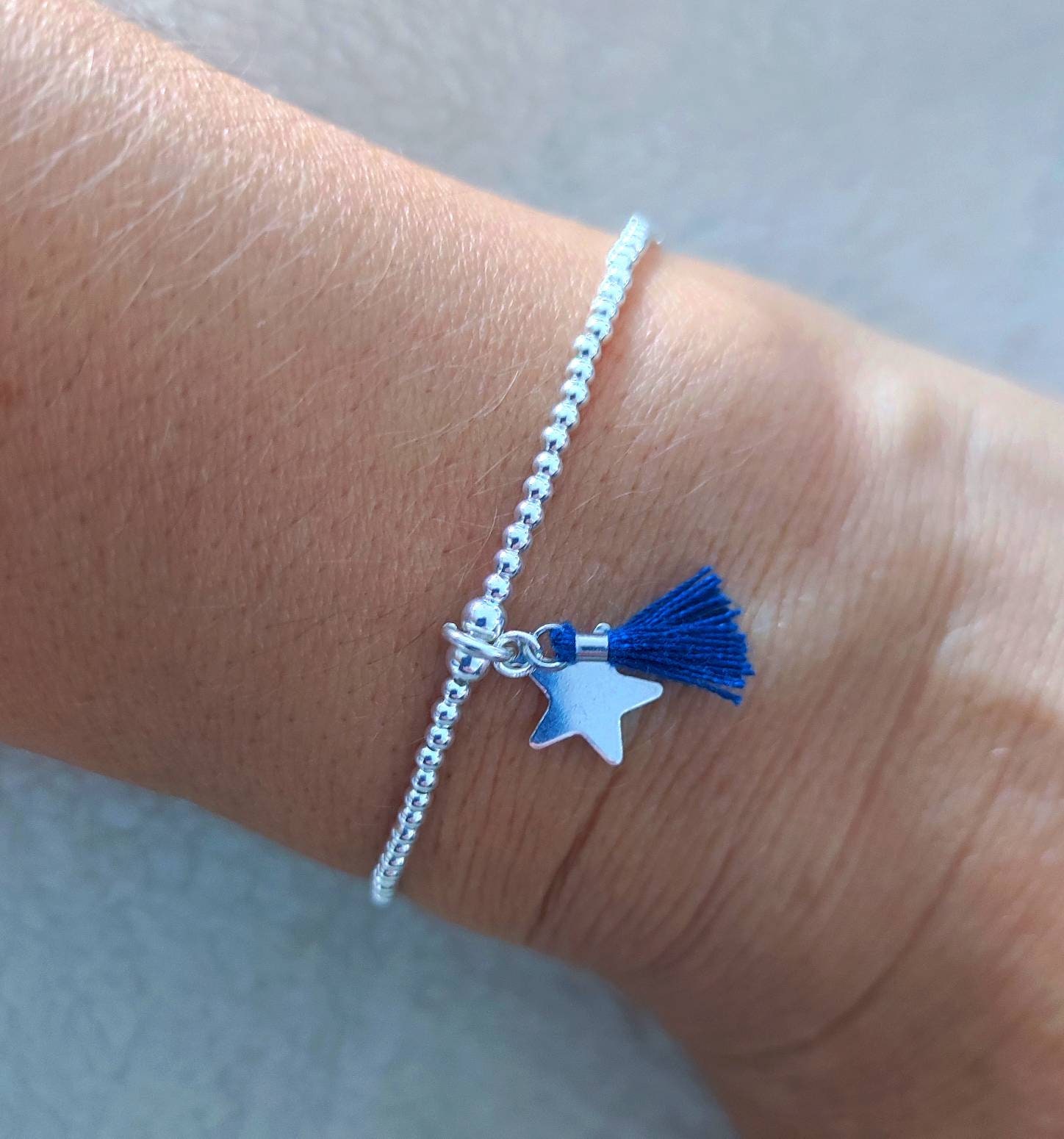 Damenarmband Aus 925Er Silber Mit Quaste Und Sternanhänger | Mehrere Farben Zur Auswahl Damenarmband Aus 925Er Silber Mit Quaste Und Sternanhänger | Mehrere Farben Zur Auswahl von Iconesbijoux