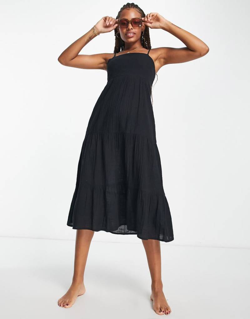 Iisla & Bird - Gestuftes, sommerliches Maxi-Strandkleid in Schwarz von Iisla & Bird