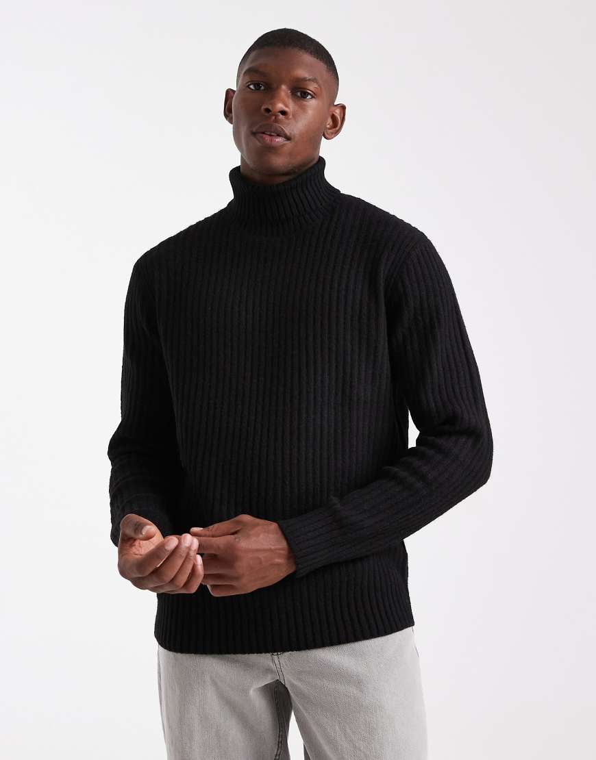 JJ Rebel - Gestrickter Rollkragenpullover in Schwarz mit Zopfmuster JJ Rebel - Gestrickter Rollkragenpullover in Schwarz mit Zopfmuster von JJ Rebel
