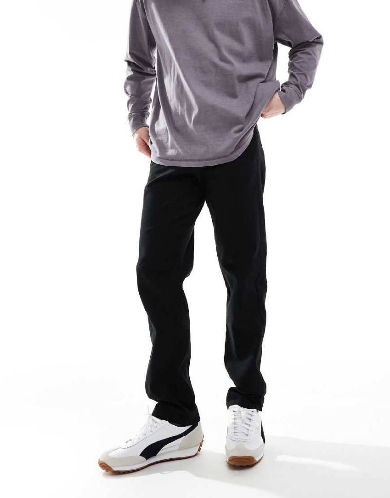 JJ Rebel - Locker geschnittene Chinohosen in Schwarz von JJ Rebel