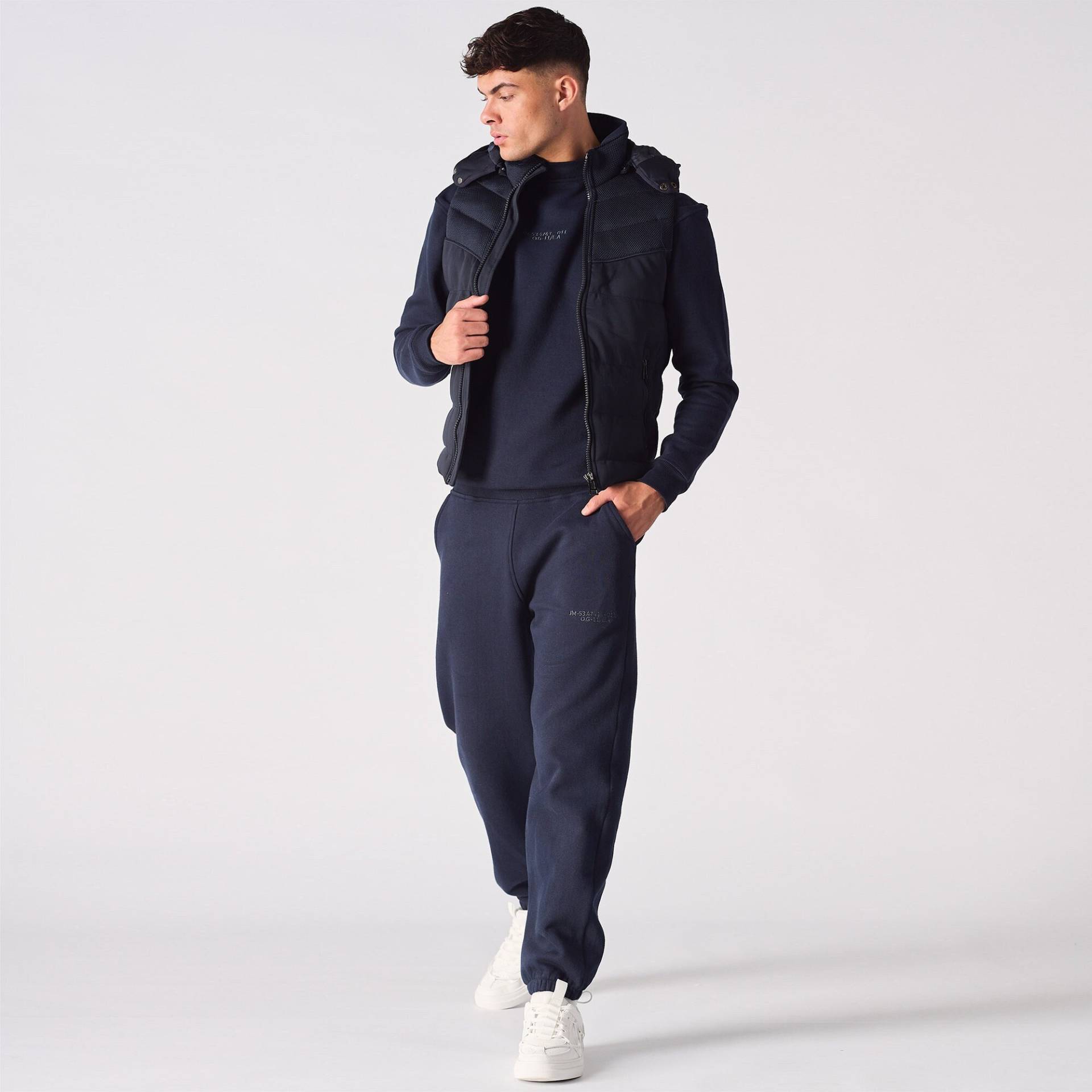 Dunkelblaue Gepolsterte Steppjacke Herren Ärmellose Weste Dunkelblaue Gepolsterte Steppjacke Herren Ärmellose Weste von JMOJOBoutique