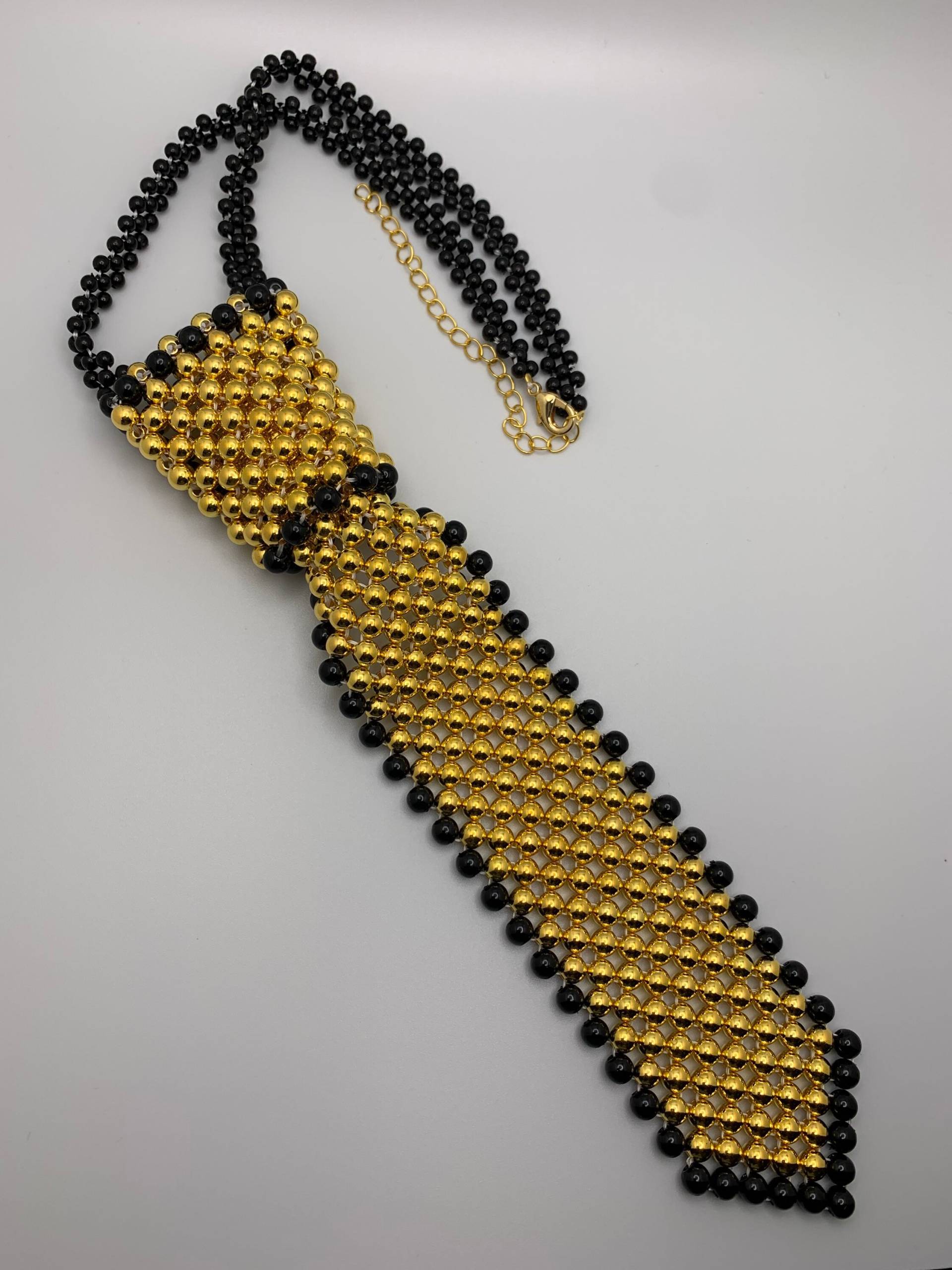 Schwarz Und Gold Perlenhalsband Schwarz Und Gold Perlenhalsband von JPSJDESIGNS
