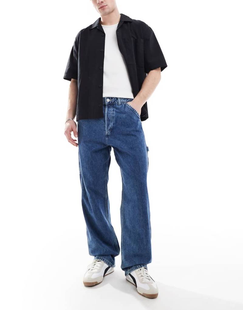 Jack & Jones - Alex - Weite Carpenter-Jeans in blauer Waschung von Jack & Jones