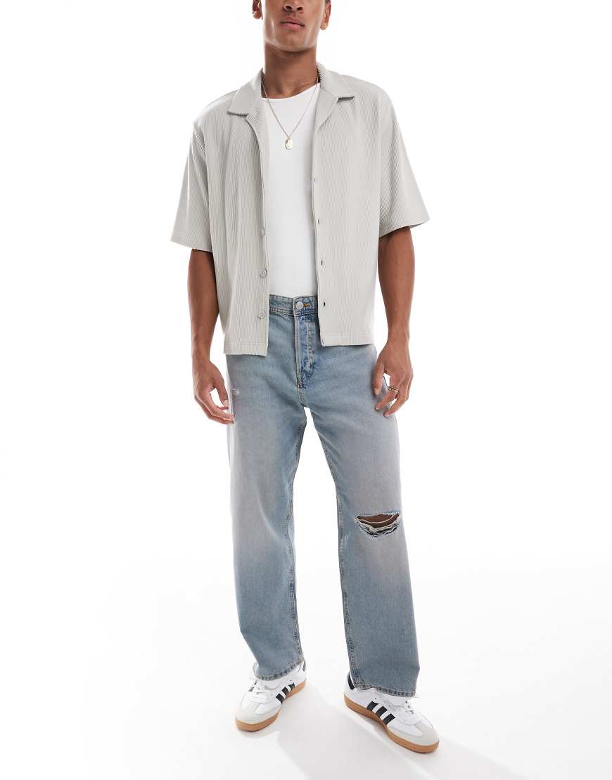 Jack & Jones - Alex - Weite Jeans in blauer Stone-Waschung mit Knie-Zierriss von Jack & Jones