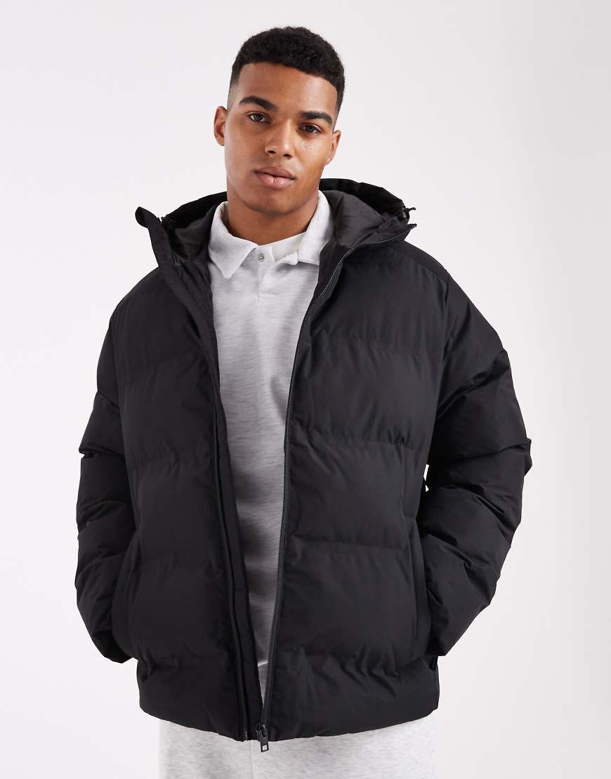 Jack & Jones - Dicke Pufferjacke in Schwarz mit Kapuze Jack & Jones - Dicke Pufferjacke in Schwarz mit Kapuze von Jack & Jones
