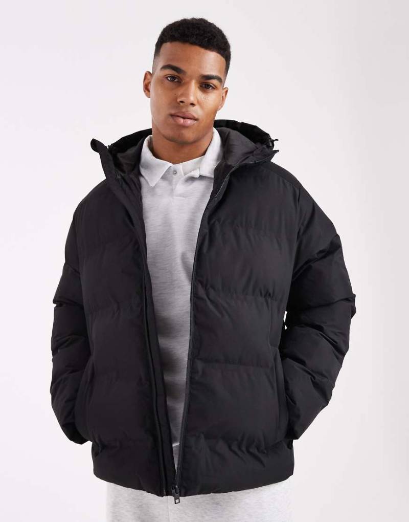 Jack & Jones - Dicke Pufferjacke in Schwarz mit Kapuze Jack & Jones - Dicke Pufferjacke in Schwarz mit Kapuze von Jack & Jones
