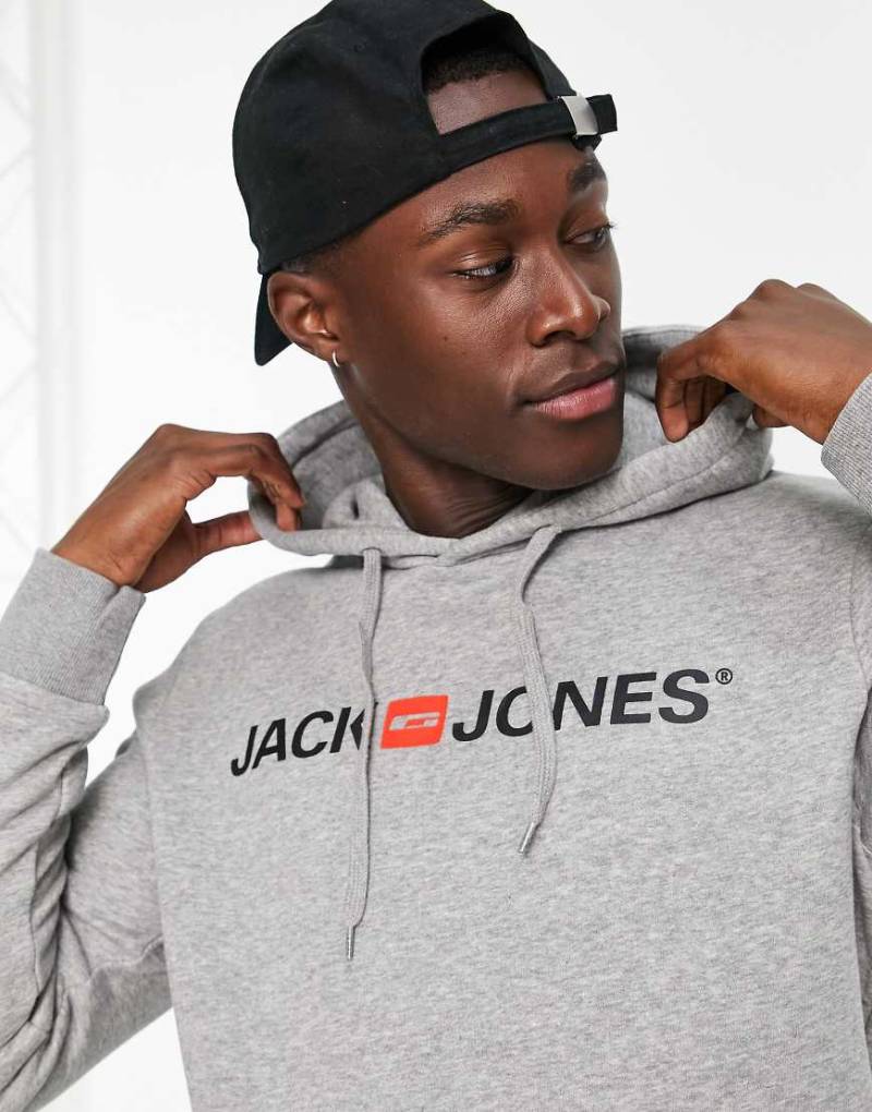 Jack & Jones Essentials - Kapuzenpullover in Grau meliert mit Logo Jack & Jones Essentials - Kapuzenpullover in Grau meliert mit Logo von Jack & Jones