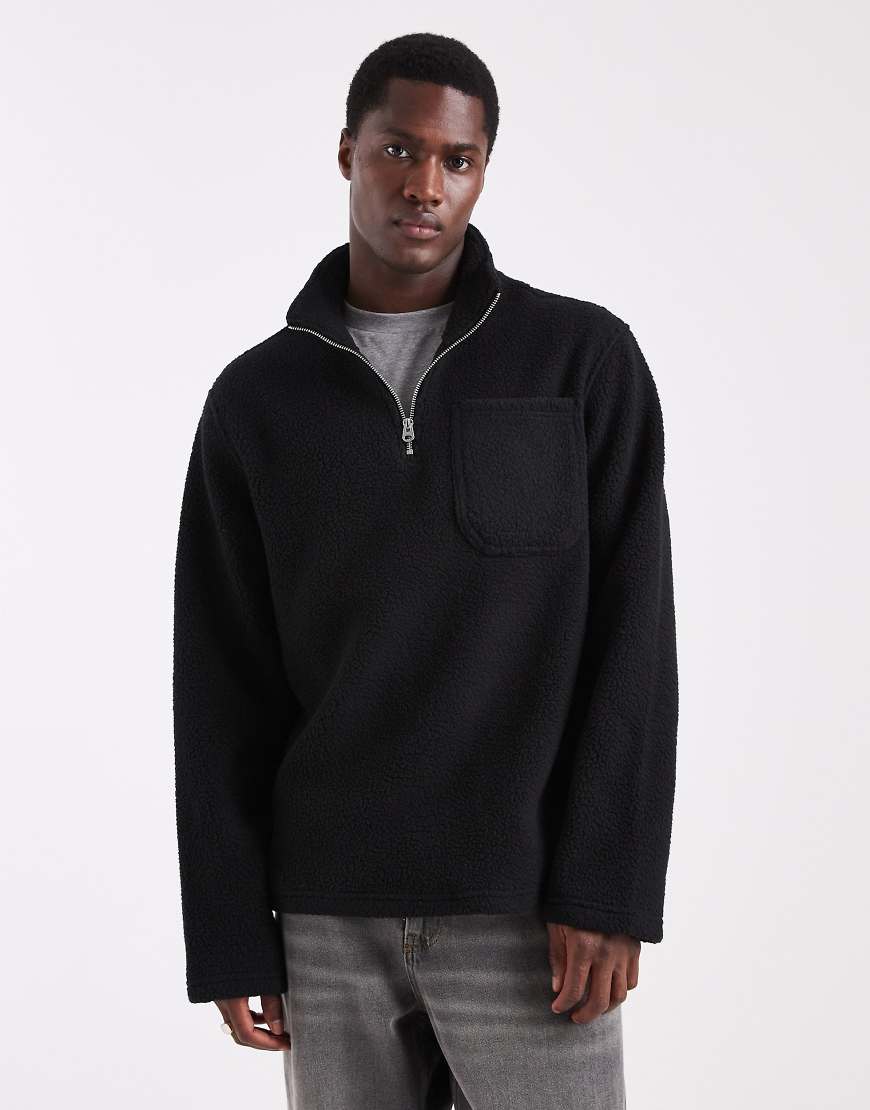Jack & Jones - Fleece-Sweatshirt in Schwarz mit kurzem Reißverschluss und Muster von Jack & Jones