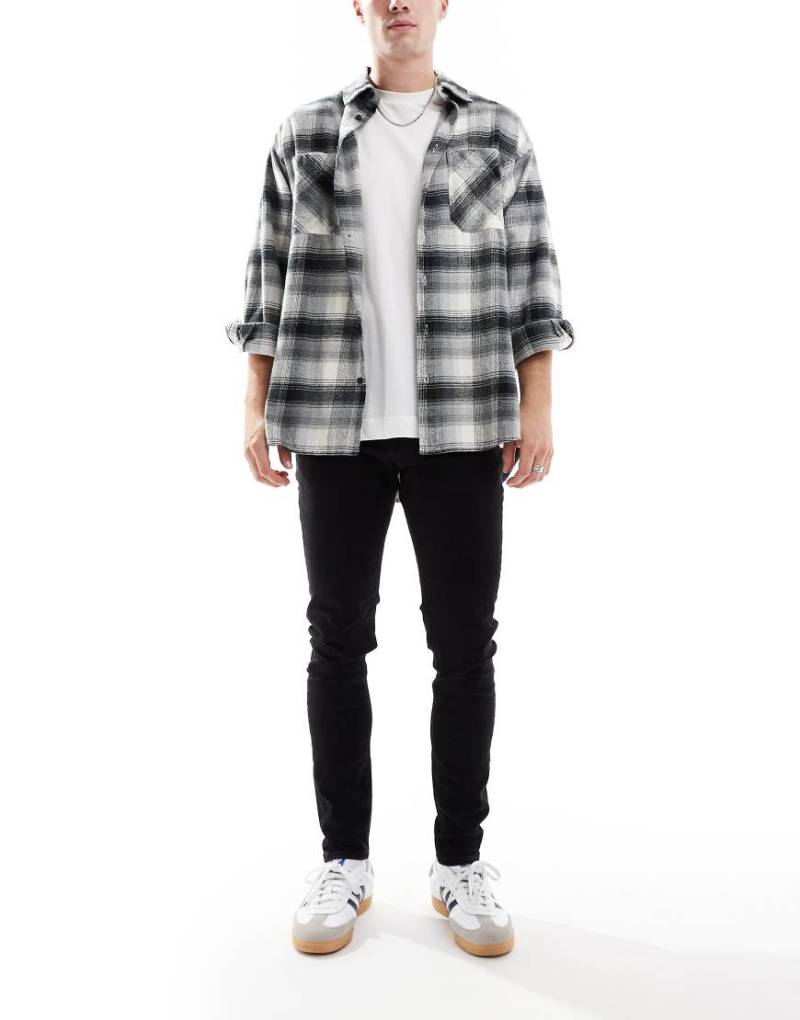 Jack & Jones - Mike - Schmal zulaufende Jeans in Schwarz von Jack & Jones