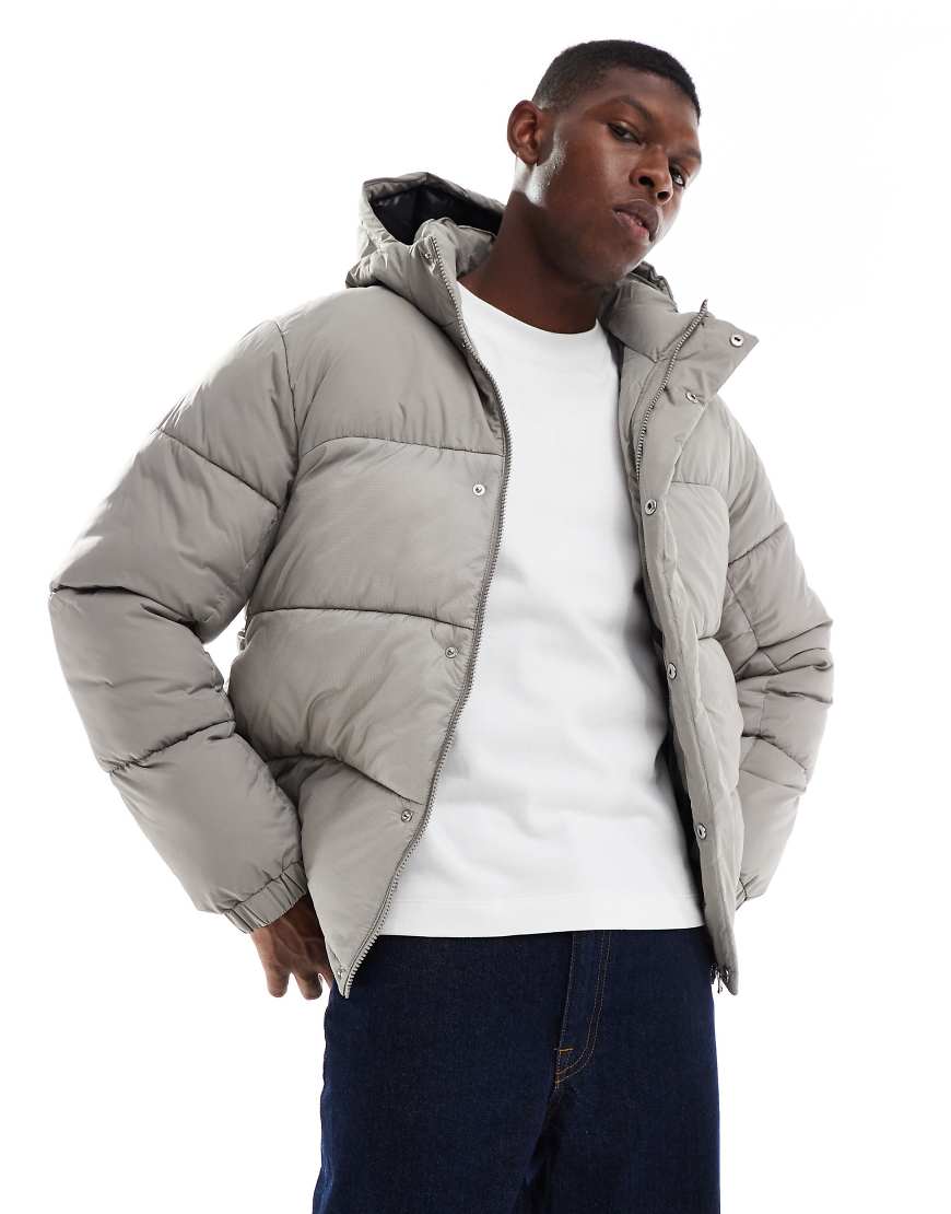 Jack & Jones - Pufferjacke in Grau mit Kapuze Jack & Jones - Pufferjacke in Grau mit Kapuze von Jack & Jones