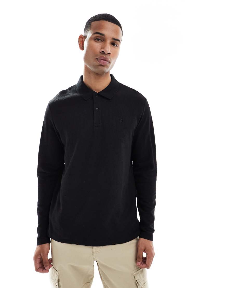 Jack & Jones - Strukturiertes, langärmliges Polohemd in Schwarz Jack & Jones - Strukturiertes, langärmliges Polohemd in Schwarz von Jack & Jones