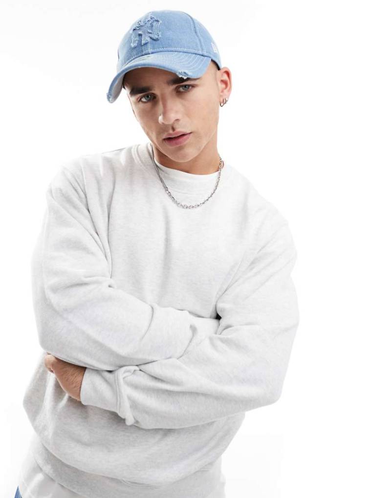 Jack & Jones - Sweatshirt in Weiß meliert mit extremem Oversize-Schnitt und Rundhalsausschnitt von Jack & Jones