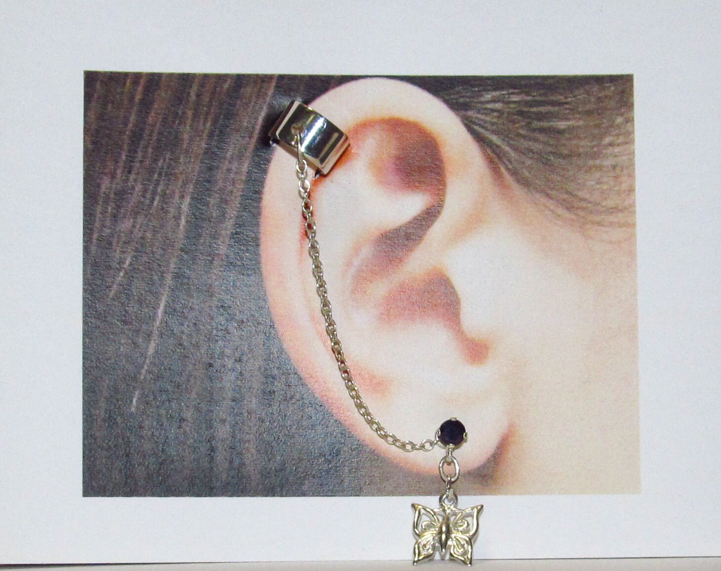 Sterling Silber Earcuff Mit Saphir Stud Und Schmetterling Baumeln Sterling Silber Earcuff Mit Saphir Stud Und Schmetterling Baumeln von JacquelinsJewels