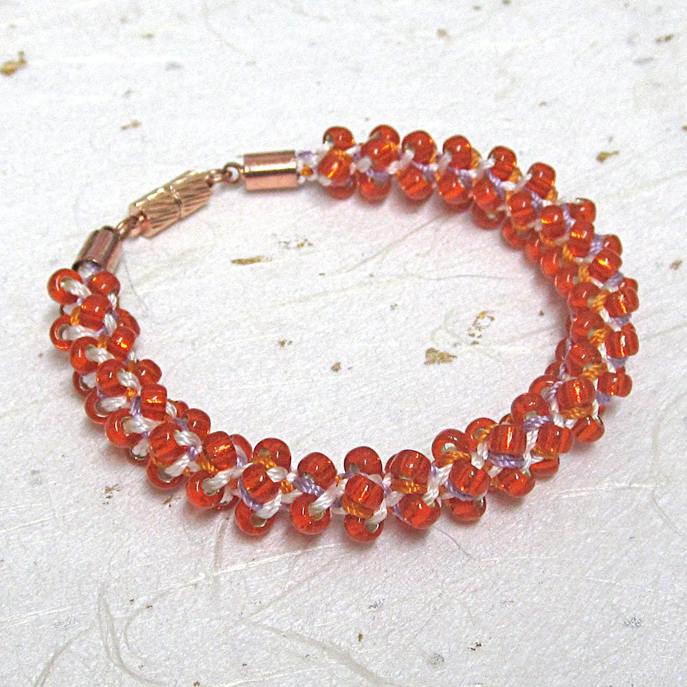 Kumihimo Perlen Armband Orange Gewebt Kumihimo Perlen Armband Orange Gewebt von JanislaJewels
