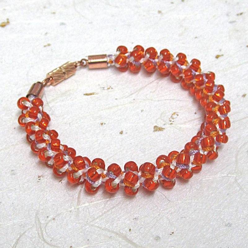 Kumihimo Perlen Armband Orange Gewebt Kumihimo Perlen Armband Orange Gewebt von JanislaJewels