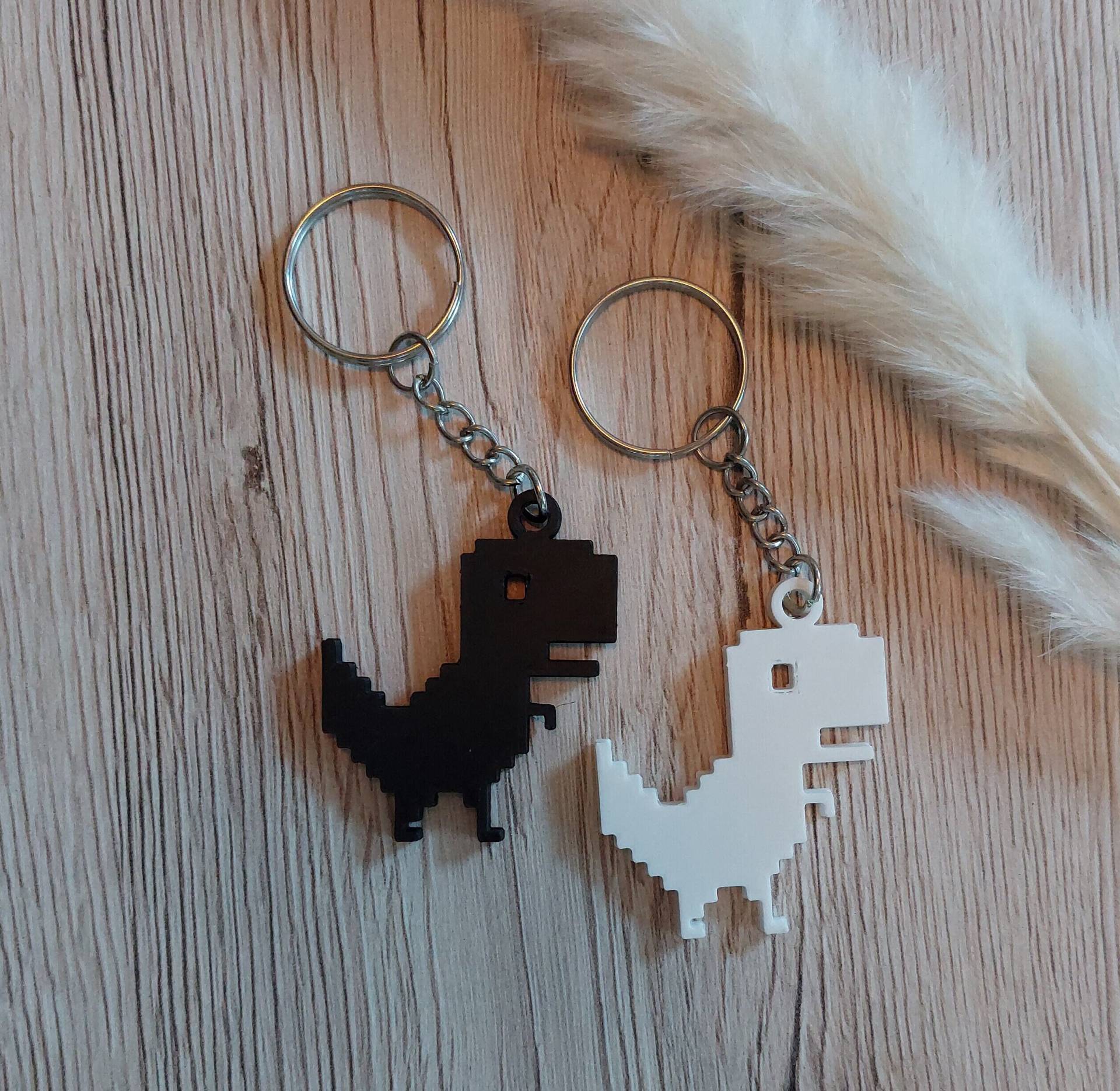 Pixel T-Rex/Dino Schlüsselanhänger/Taschenanhänger, 3D Gedruckt, Einzigartiges Geschenk, Schwarz, Weiß , Pla/Kunststoff Pixel T-Rex/Dino Schlüsselanhänger/Taschenanhänger, 3D Gedruckt, Einzigartiges Geschenk, Schwarz, Weiß , Pla/Kunststoff von Jansprint