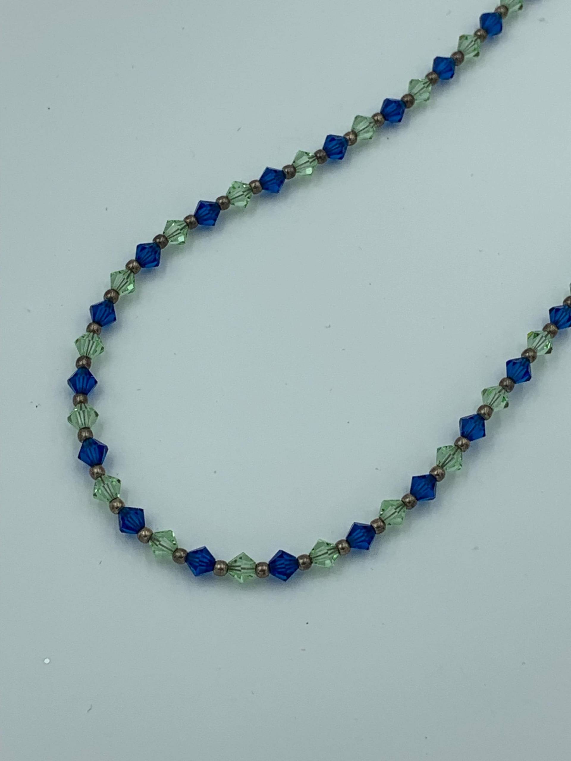 Swarovski Kristall Und Sterling Silber 21-Zoll-Perlen-Halskette Swarovski Kristall Und Sterling Silber 21-Zoll-Perlen-Halskette von JewelGrotto