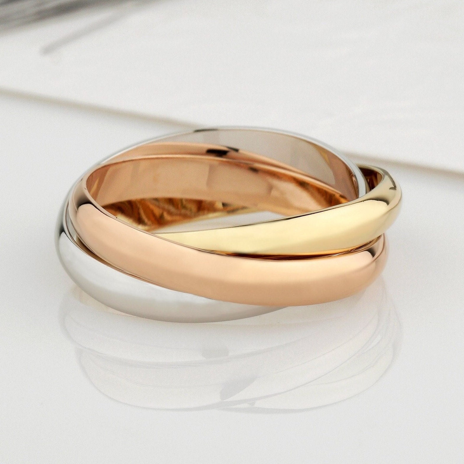 Tri Color Rolling Ring . 14K Triplet Ring. Ineinander Greifende Bänder. Dreifach Band Einzigartiger Ehering. Fidget Goldwalzenband Tri Color Rolling Ring . 14K Triplet Ring. Ineinander Greifende Bänder. Dreifach Band Einzigartiger Ehering. Fidget Goldwalzenband von JewelryEscorial