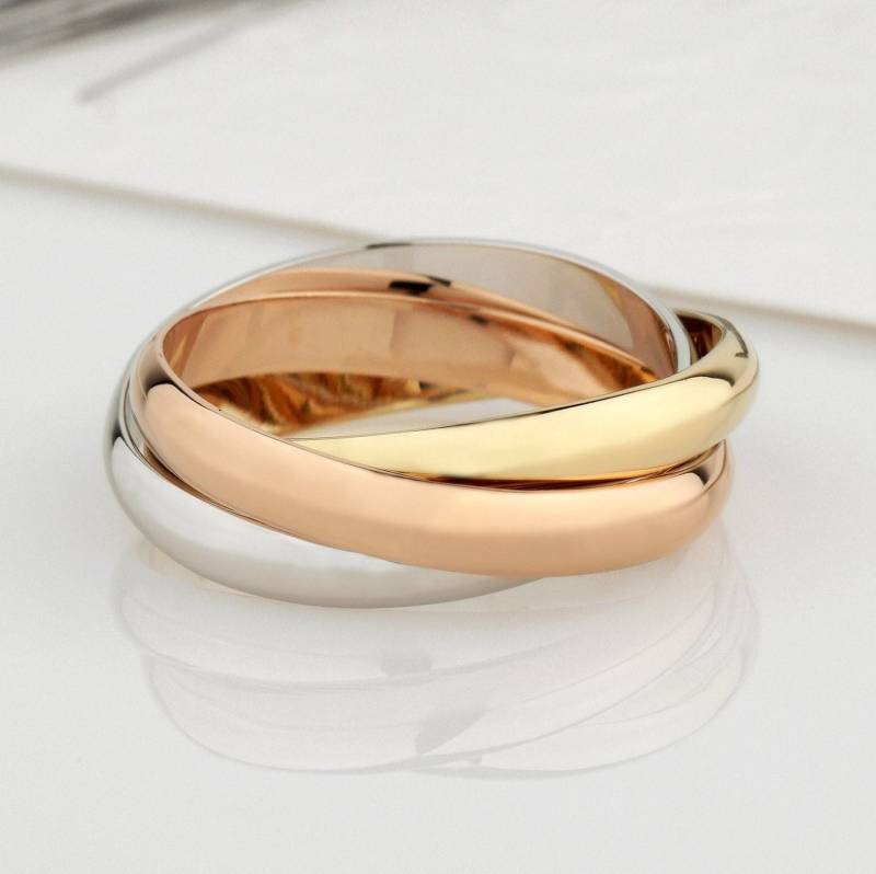 Tri Color Rolling Ring . 14K Triplet Ring. Ineinander Greifende Bänder. Dreifach Band Einzigartiger Ehering. Fidget Goldwalzenband von JewelryEscorial