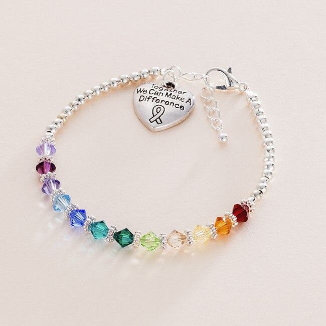 Bewusstseins-Armband Mit Herz-Anhänger Der Aufschrift "Together We Can Make Ainder." von Jewels4girls