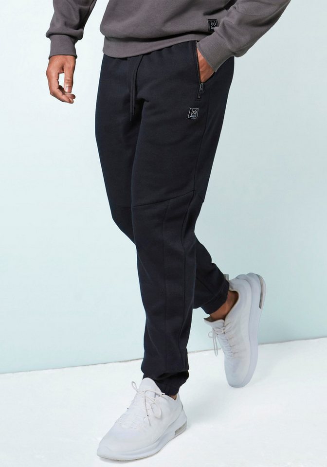 John Devin Sweathose Jogginghose mit seitlichen Taschen und Bindeband aus Baumwoll-Mix von John Devin