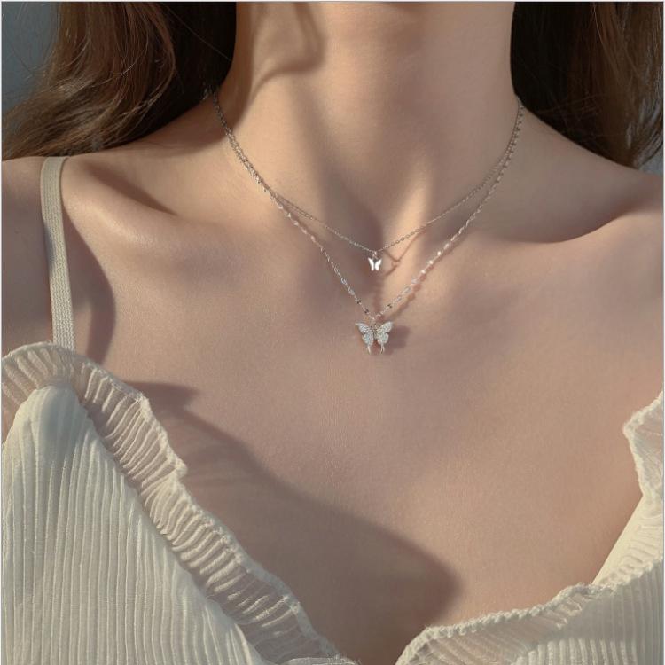 2023 neu gestaltetElegante Gold-Silber-Halskette für Frauen Schmetterling Perle Bogen Rosa Zirkon Tulpe Anhänger Halsband Modeaccessoires Schmuck 47 von Joom DACH