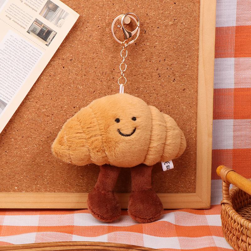 Croissant Plüsch Spielzeug Schlüsselanhänger Cartoon Lebensmittel weich gefüllte Puppe Anhänger Auto Schlüsselanhänger Rucksack Tasche Dekor Kind Geschenk A2 von Joom DACH