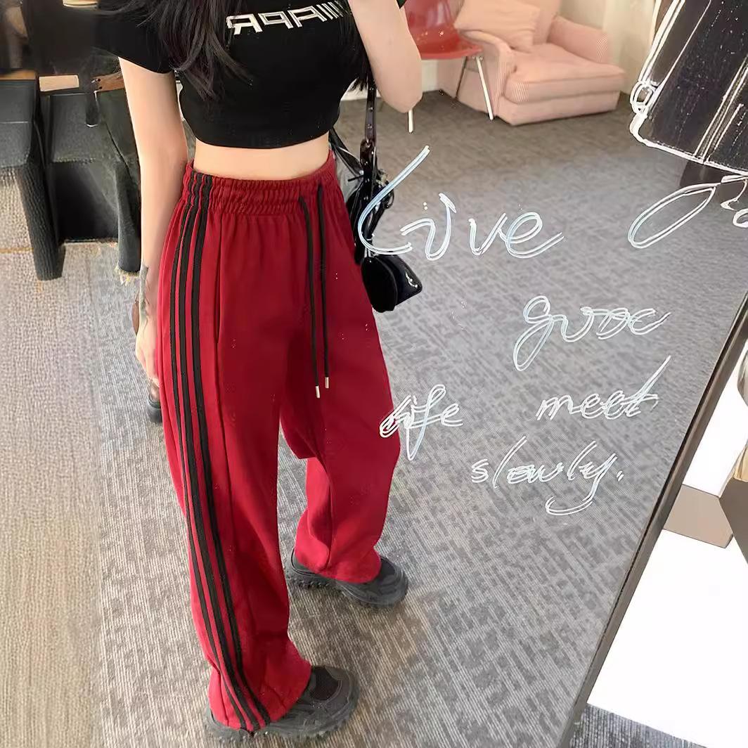 Dreifache amerikanische Sporthose für Damen im Frühling und Herbst Neue gestreifte Bindefüße Lässige kleine weite Beinweite Lockere Jogginghose 4XL von Joom DACH