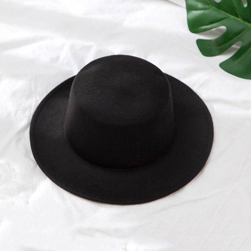 Einfarbig Nachahmung Woolen Hut Frauen Filz Fedoras Jazz Kappe Weibliche Mädchen Einfache Breite Krempe Flache Top Hüte schwarz von Joom DACH
