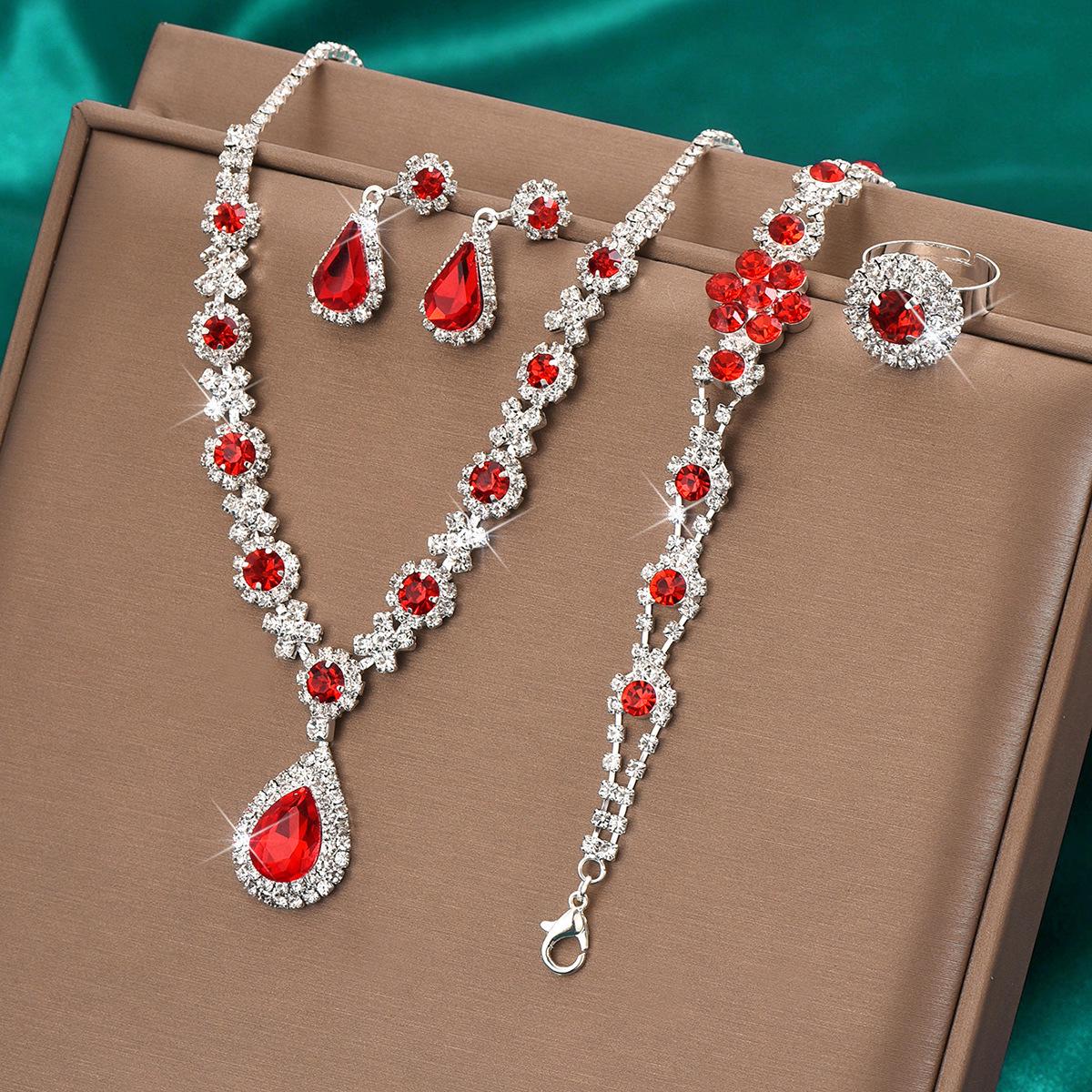 Elegantes Schmuckset mit Kristall-Edelsteinen: Halskette, Ohrringe, Armband und Ring in Tropfenform für Damen von Joom DACH