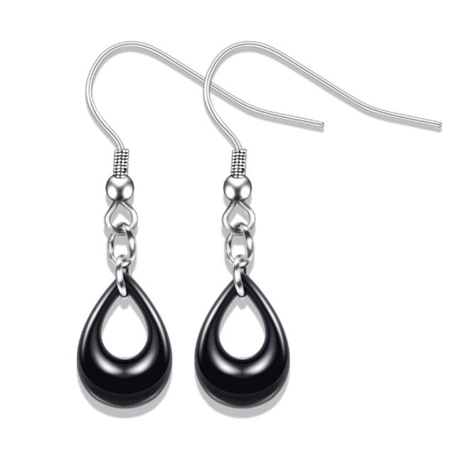 Explosionsförmige ovale Ohrringe aus Keramik und Titanstahl mit Kristallen aus Österreich, 2 Farben, passend für Damen und Damen für Partys schwarz von Joom DACH